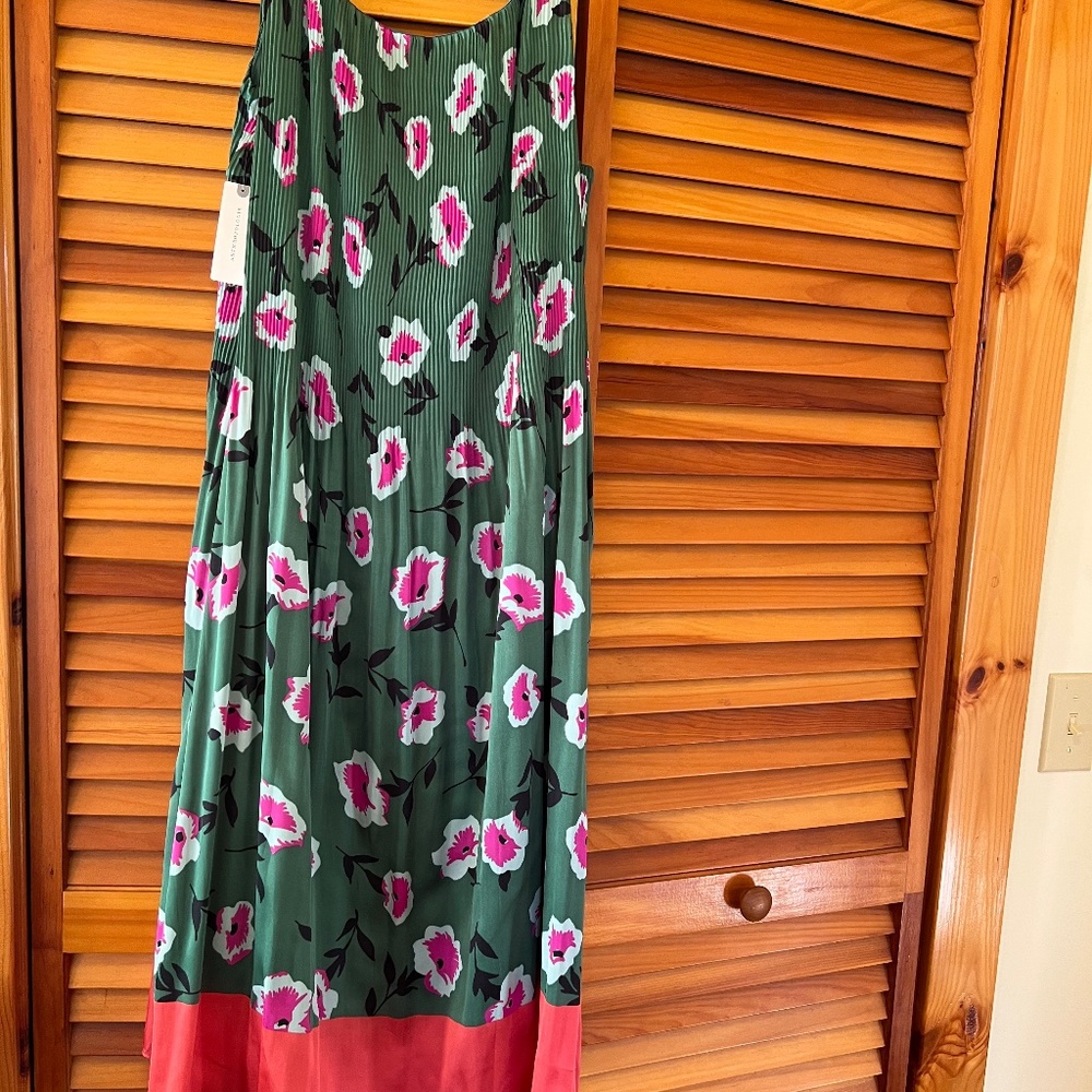 Anthropologie dress NWT. Size M. Could fit M-XL. Silky with small pleats on top